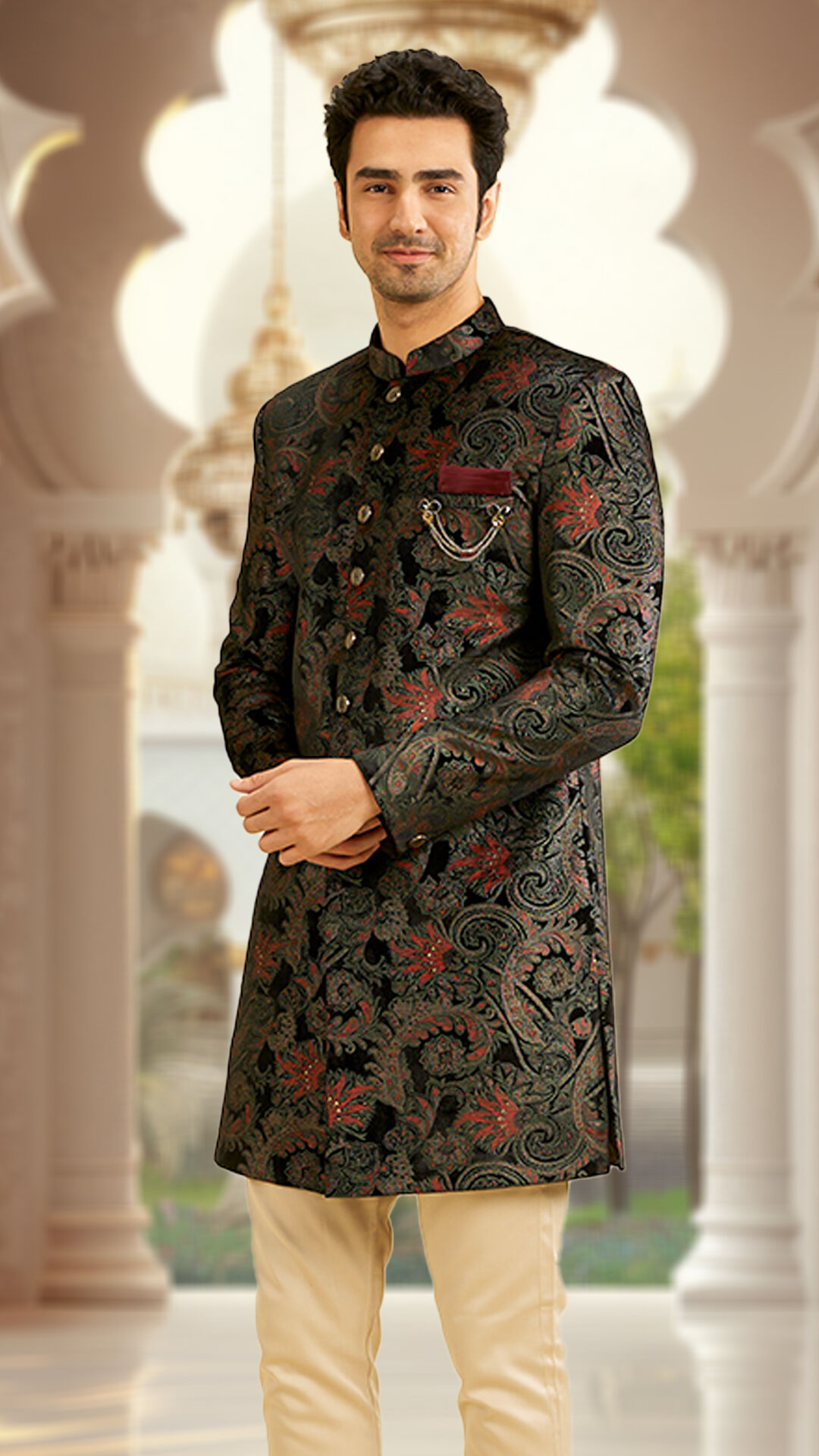 Man wearing a black kurta and white pajama for a traditional wedding photoshoot